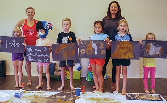 Families come out to Claremont Yoga