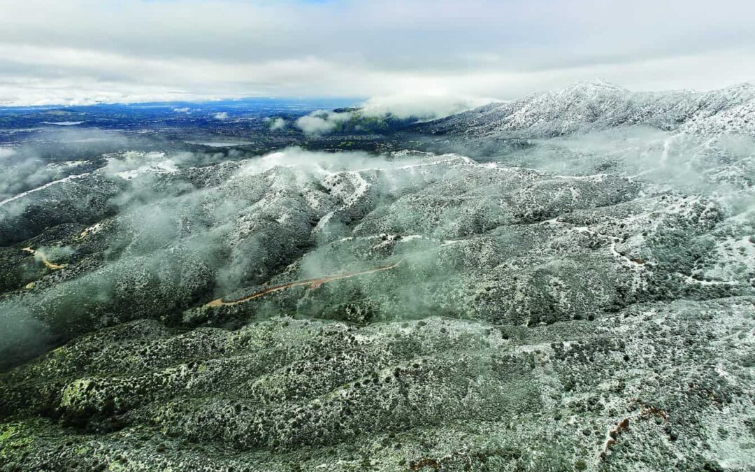Aerial photos show Saturday snow level below 1,500 feet